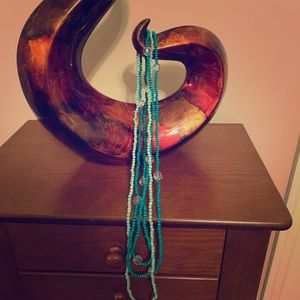 Three groups of necklaces.Blue & Green